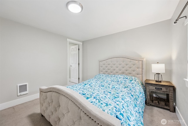 carpeted bedroom with baseboards