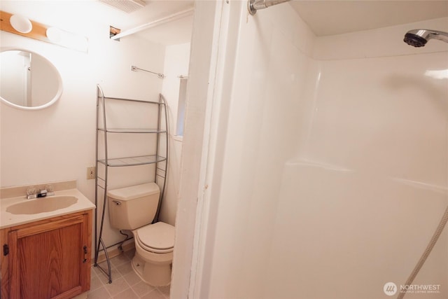 full bath with visible vents, toilet, tile patterned flooring, walk in shower, and vanity