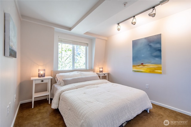 425 Vine St Unit 708, Seattle, WA 98121 - carpeted bedroom featuring baseboards and rail lighting