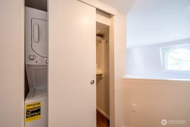 425 Vine St Unit 708, Seattle, WA 98121 - laundry room featuring stacked washer / drying machine