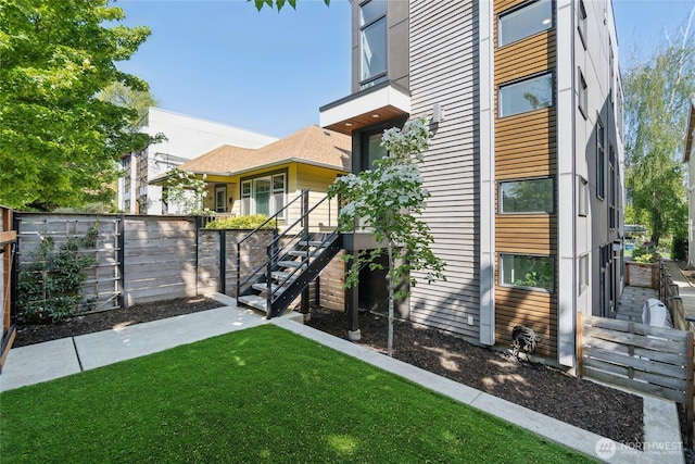 6610 Corson Ave S, Seattle, WA 98108 - view of yard with fence and stairs