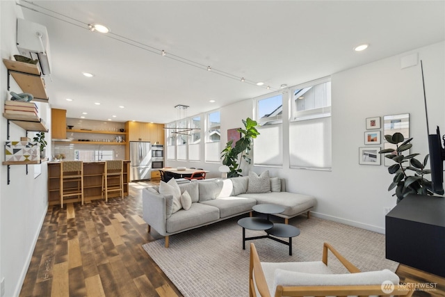 6610 Corson Ave S, Seattle, WA 98108 - living area featuring baseboards, recessed lighting, dark wood-type flooring, and a chandelier