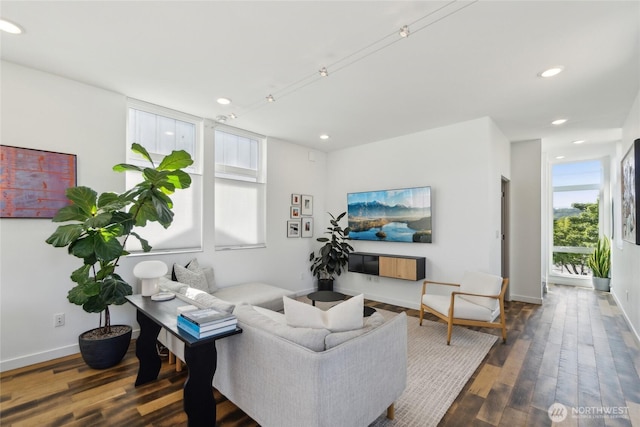 6610 Corson Ave S, Seattle, WA 98108 - living room featuring baseboards, recessed lighting, and wood finished floors