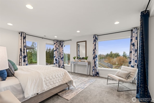 bedroom with multiple windows, carpet, and recessed lighting