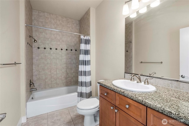 bathroom with vanity, shower / tub combo, tile patterned flooring, and toilet