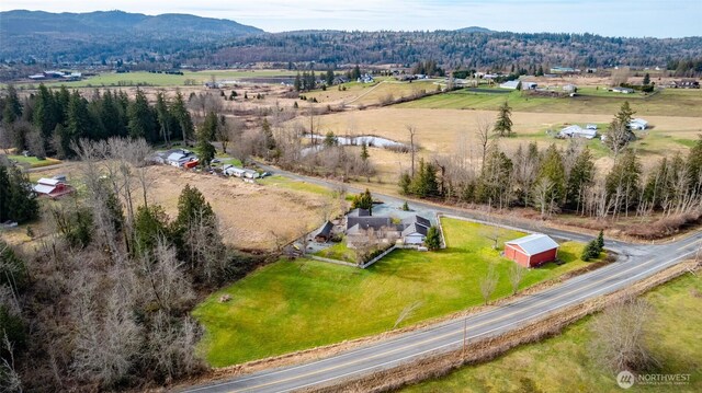 bird's eye view with a mountain view and a rural view