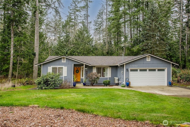 ranch-style home with driveway, an attached garage, a front lawn, and roof with shingles