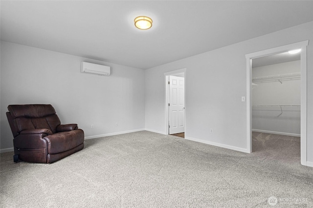 living area featuring carpet floors, an AC wall unit, and baseboards