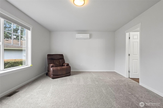 living area featuring carpet floors, a wall unit AC, visible vents, and baseboards