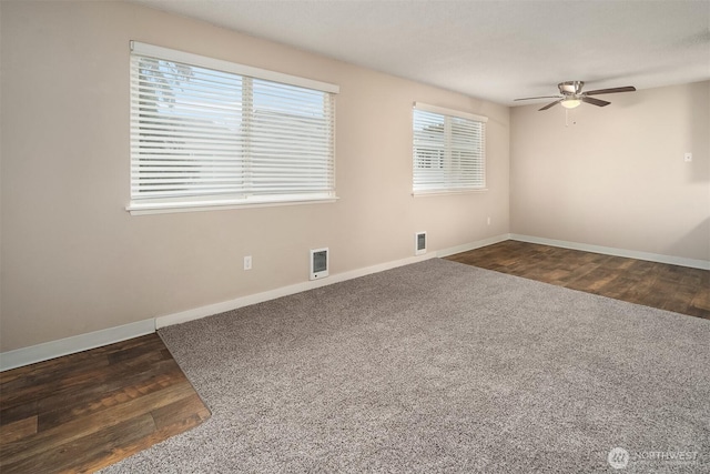 12712-12720 C St S, Tacoma, WA 98444 - empty room featuring a ceiling fan, wood finished floors, visible vents, and baseboards