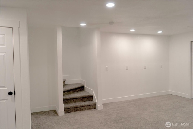 basement with baseboards, carpet, and recessed lighting