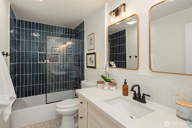 full bath featuring shower / washtub combination, vanity, and toilet