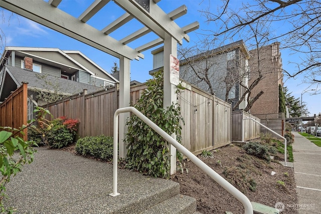 exterior space with a fenced backyard