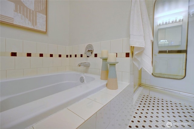 full bathroom featuring a shower, a bath, and tile patterned floors