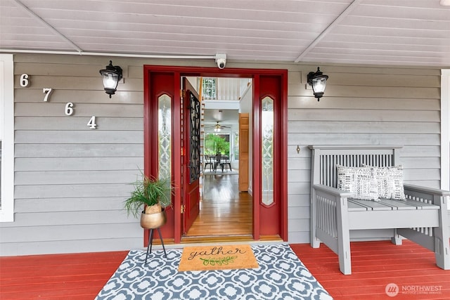 entrance to property featuring covered porch