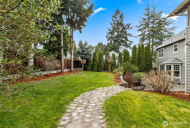 view of yard with fence