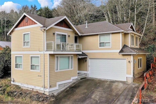 view of front facade featuring a balcony, a garage, a shingled roof, driveway, and board and batten siding