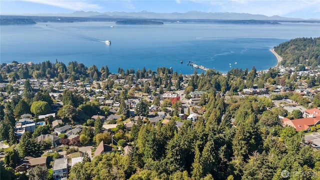 birds eye view of property with a residential view and a water and mountain view