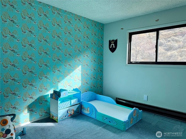 unfurnished bedroom featuring carpet floors and a textured ceiling