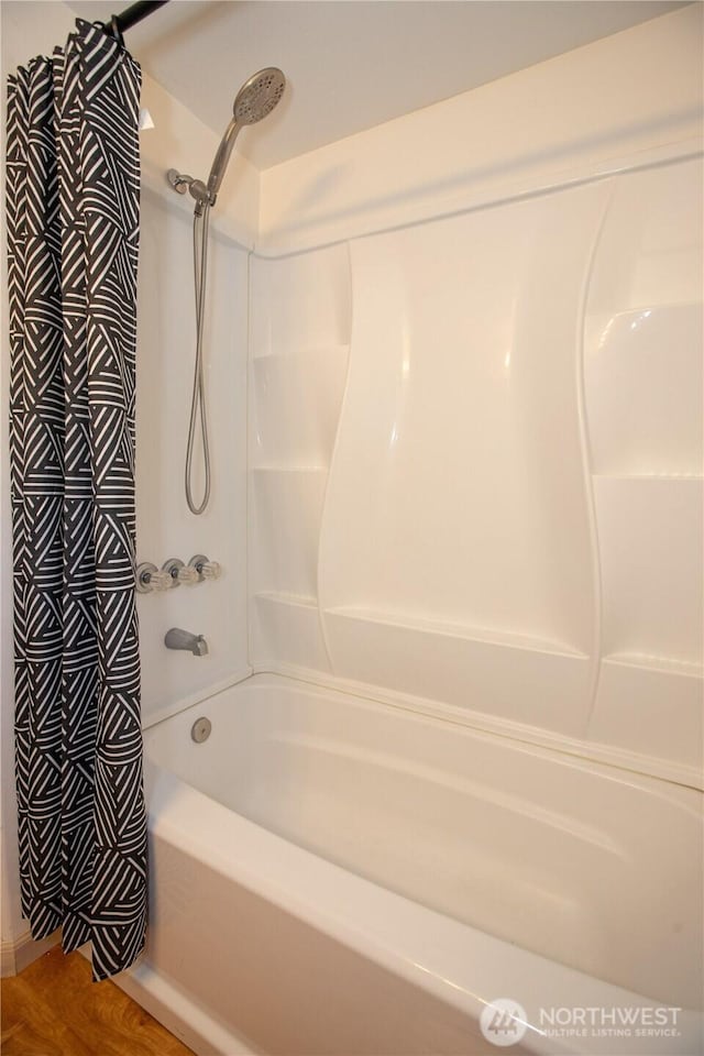 full bathroom featuring shower / tub combo