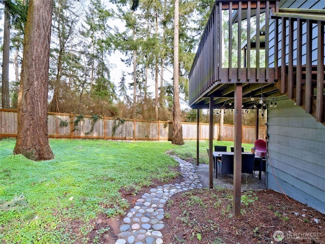 view of yard with a patio area and a fenced backyard