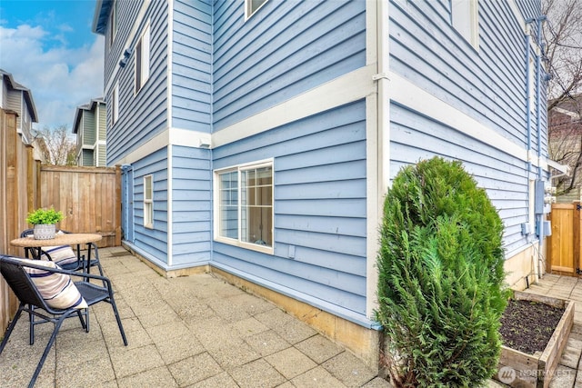 view of patio with fence