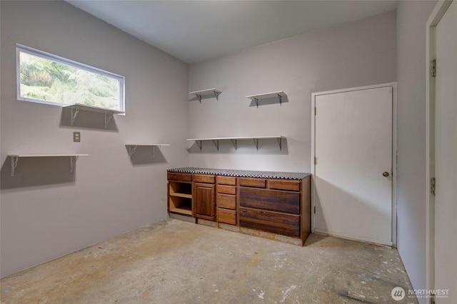 interior space featuring concrete floors