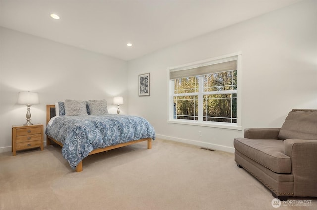 carpeted bedroom with visible vents, recessed lighting, and baseboards