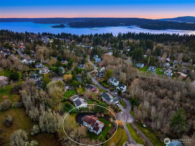 aerial view featuring a water view