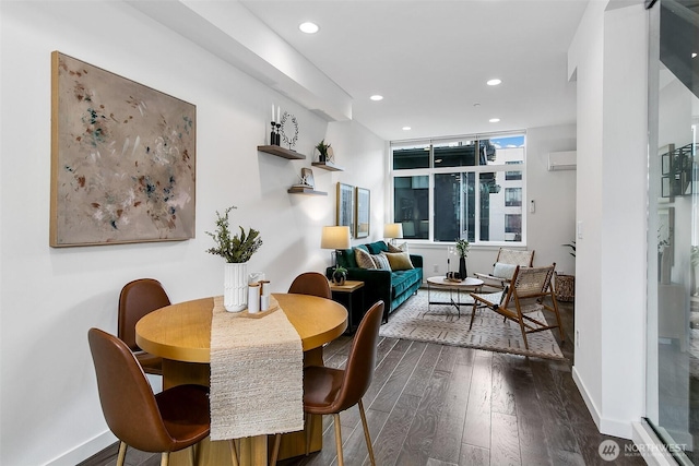 dining room with a wall mounted AC, baseboards, dark wood-style flooring, and recessed lighting