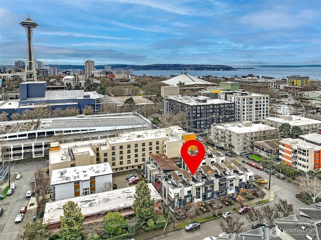 aerial view featuring a water view and a city view