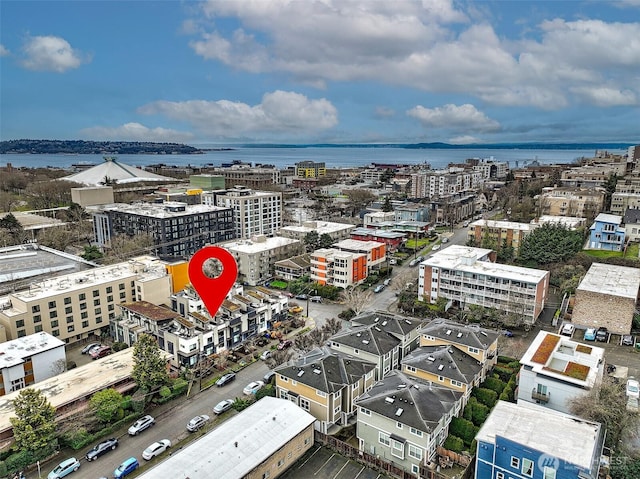 aerial view with a water view and a city view