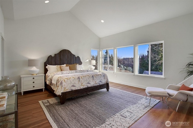 bedroom featuring recessed lighting, high vaulted ceiling, and wood finished floors