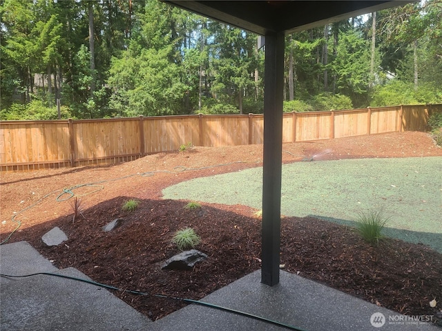 view of yard featuring a fenced backyard