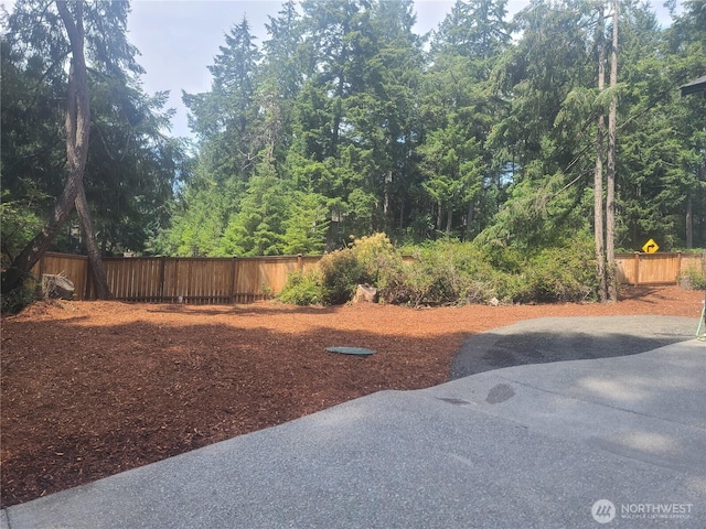 view of yard with fence