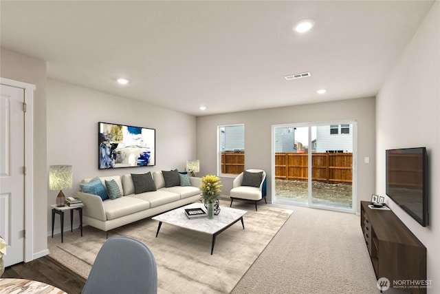 living area featuring carpet, visible vents, and recessed lighting