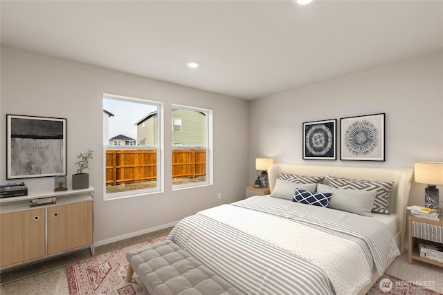 bedroom with recessed lighting, light carpet, and baseboards