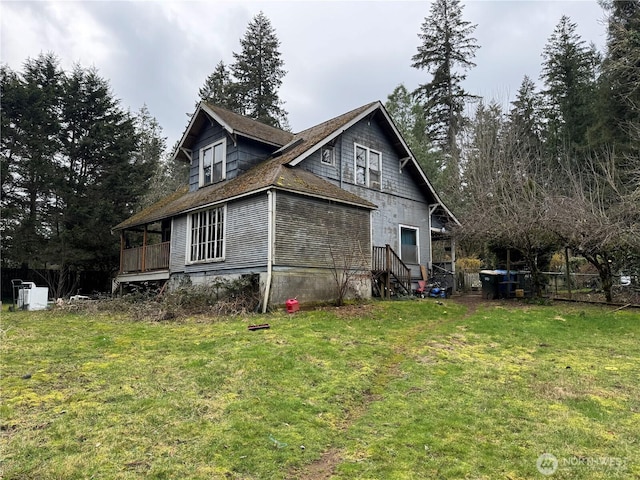 4700 Delta Ln SE, Tumwater, WA 98501 - view of side of home featuring a lawn