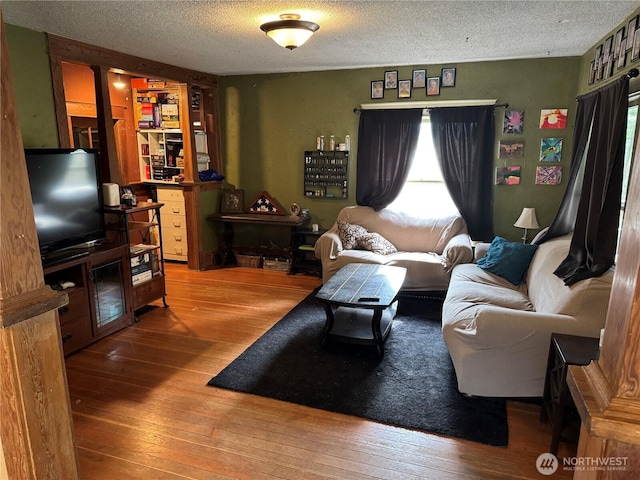 4700 Delta Ln SE, Tumwater, WA 98501 - living room featuring hardwood / wood-style floors and a textured ceiling