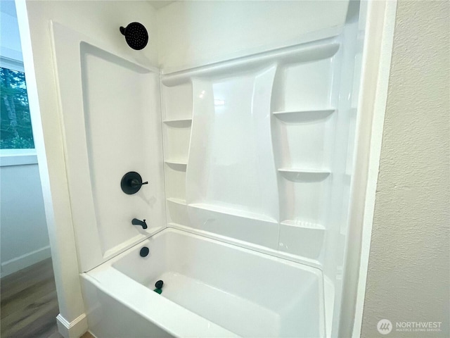 full bathroom featuring tub / shower combination