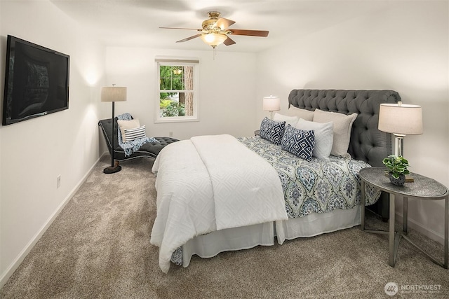 carpeted bedroom featuring a ceiling fan and baseboards