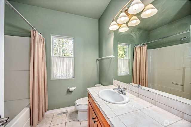 bathroom featuring visible vents, toilet, tile patterned flooring, shower / bathtub combination with curtain, and vanity