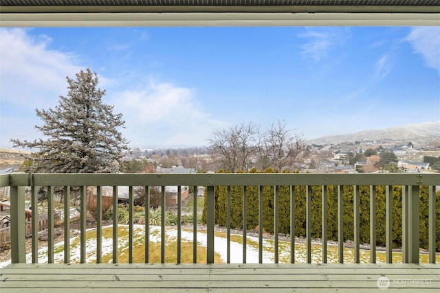 balcony featuring a mountain view