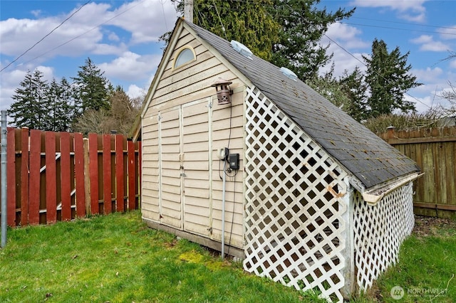 view of shed featuring a fenced backyard