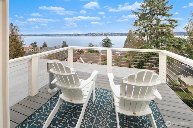 wooden terrace with a water view