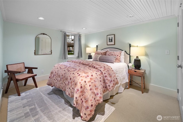 bedroom featuring baseboards, ornamental molding, and light colored carpet