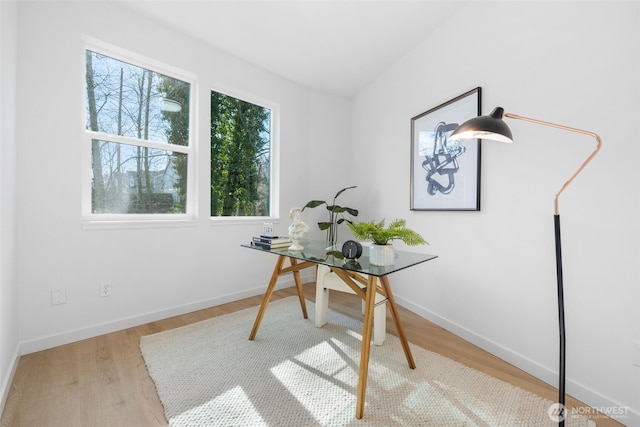 home office featuring light wood-style floors and baseboards