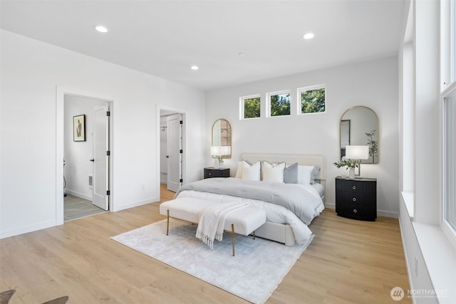 bedroom featuring light wood-style floors, recessed lighting, and baseboards