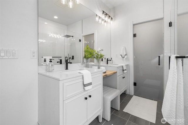 full bath featuring recessed lighting, a stall shower, tile patterned flooring, and vanity