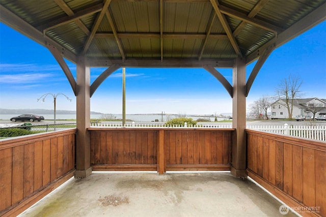 view of patio / terrace featuring a gazebo and fence